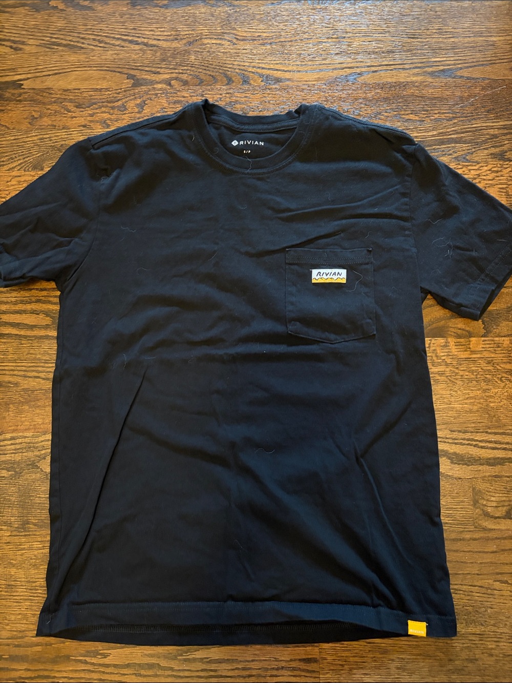 Rivian Men’s Black Chest Pocket Tee